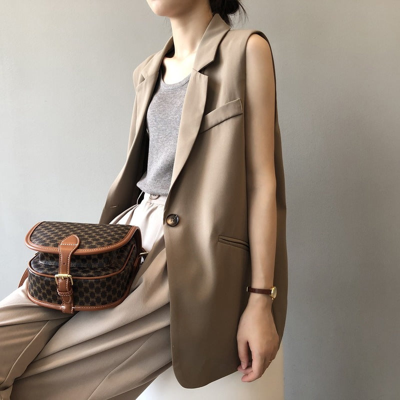 Women's Contemporary Sleeveless Blazer with Pocket and Button | Perfect for Casual Days
