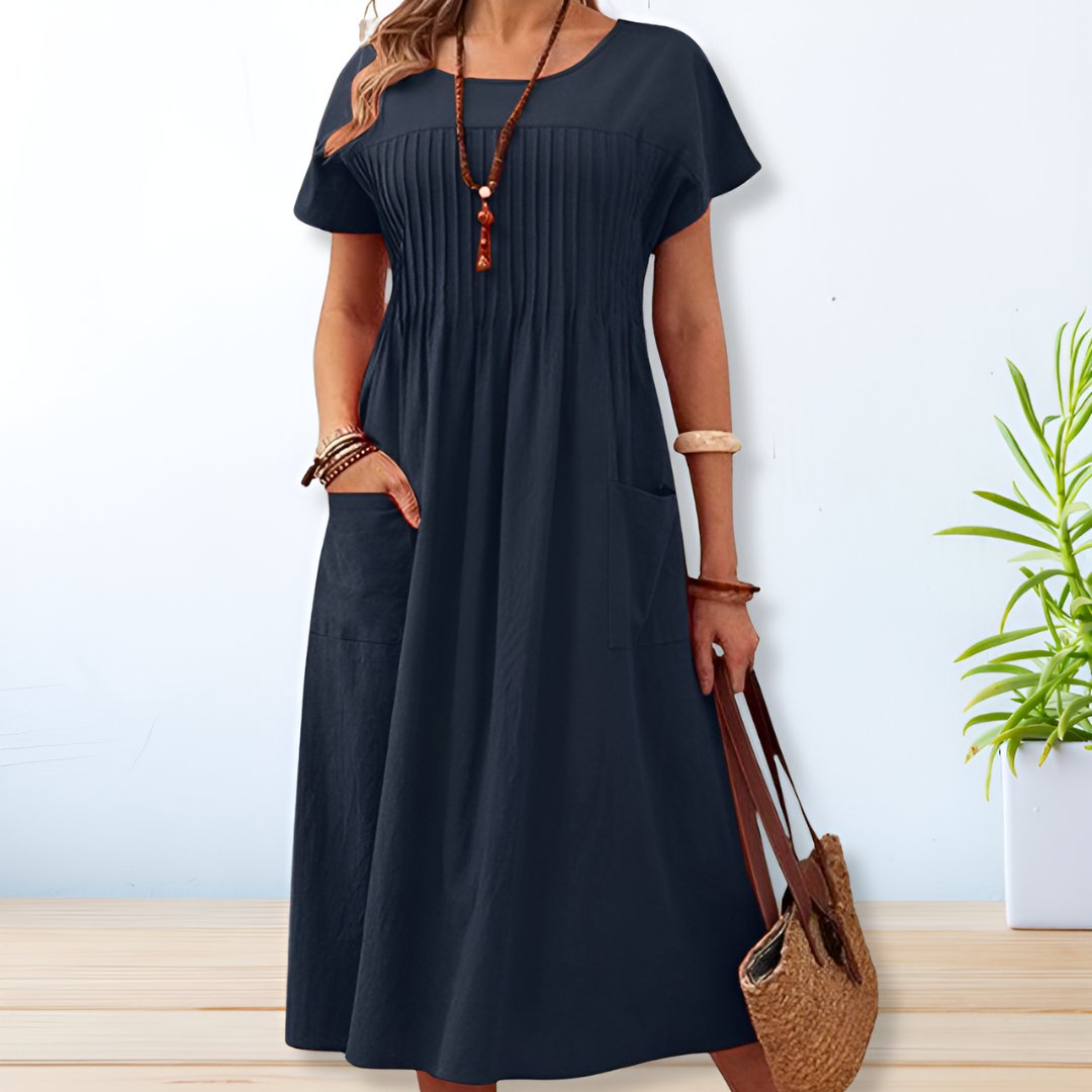 https://cdn.shopify.com/s/files/1/0880/6714/6072/files/alira-relaxed-fit-day-dress-431817.jpg?v=1741739844