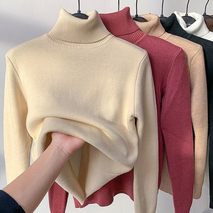 The colors identified in the image are:

- White (for the light-colored sweater)
- Red (for the maroon sweater)
- Black (for the dark sweater)
- Apricot (for the beige/tan sweater)