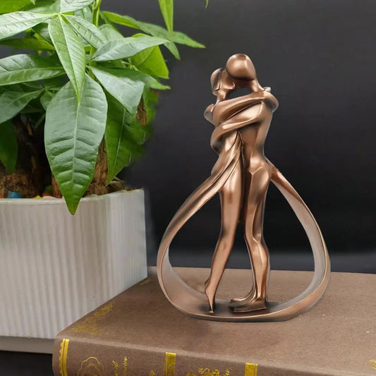 Decorative Sculpture – Embracing Figures with Intricate Details 0