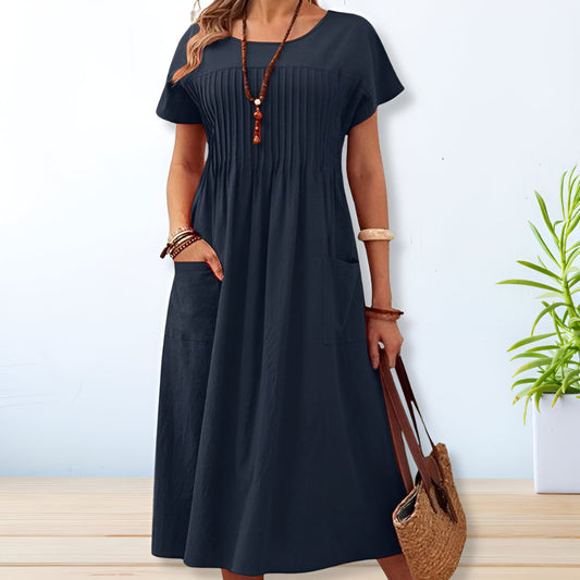 https://cdn.shopify.com/s/files/1/0880/6714/6072/files/alira-relaxed-fit-day-dress-431817.jpg?v=1741739844